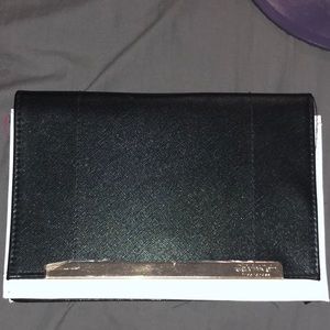 Black and white Calvin Klein clutch